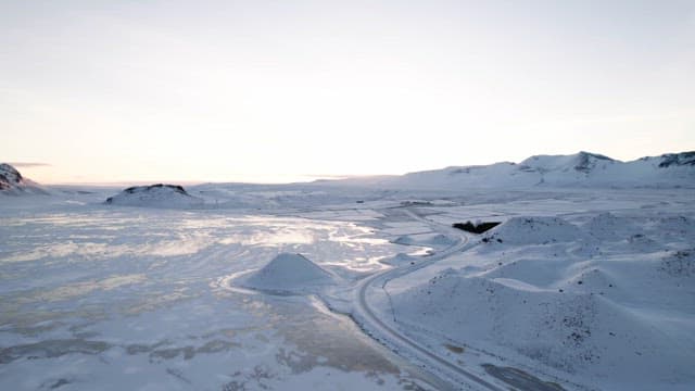 Snow-covered landscape with mountains