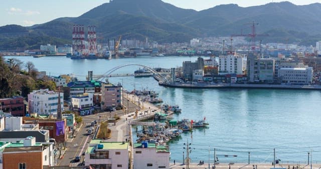 Scenery from day to night of a busy port city