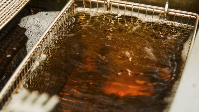 Deep Fryer in Action at a Kitchen in Restaurant