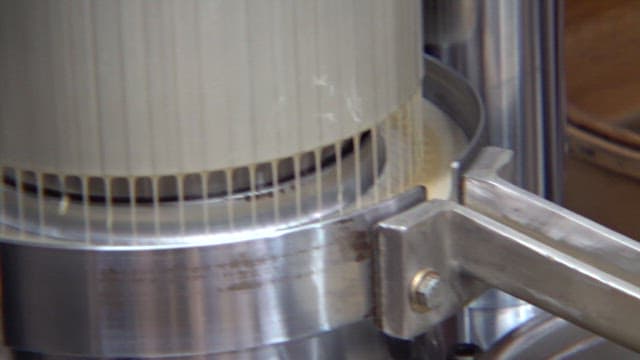 Oil Expeller at a Factory Squeezing Fresh Sesame Oil