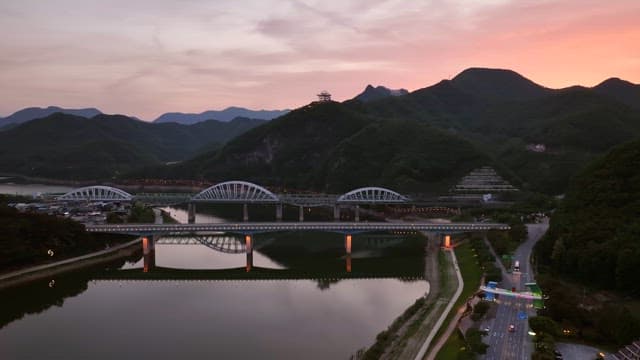 Bridges over a river at sunset