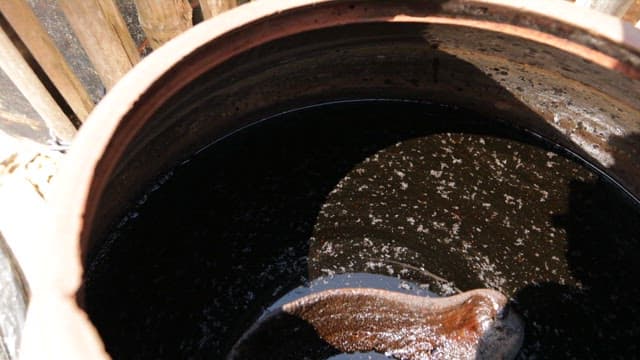 Traditional fermented soy sauce filled in a traditional jar