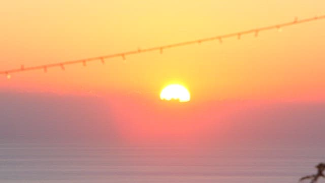 Vibrant Sunset Over the Horizon