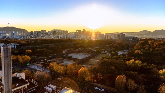 Sunset to night over a historical palace in the city