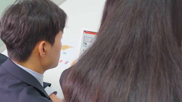 Professional analyzing data on laptop