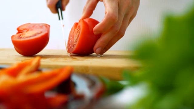 Preparing Fresh Vegetables on a Cutting Board