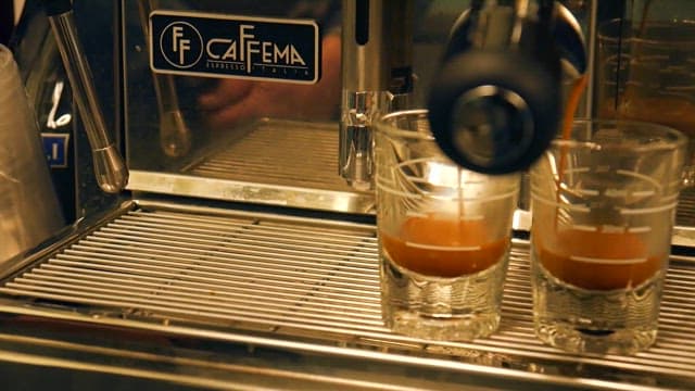 Fresh Espresso Poured into Glasses
