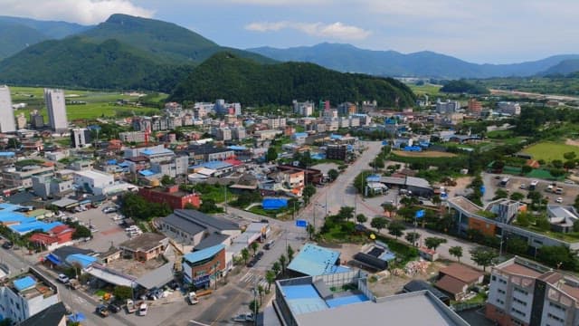 Colorful town surrounded by greenery