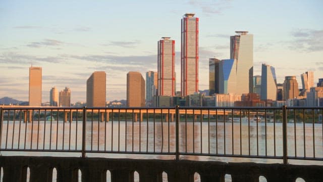 City skyline at sunset with a view of the river