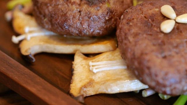 Grilled Short Rib Patties on Wooden Serving Dish