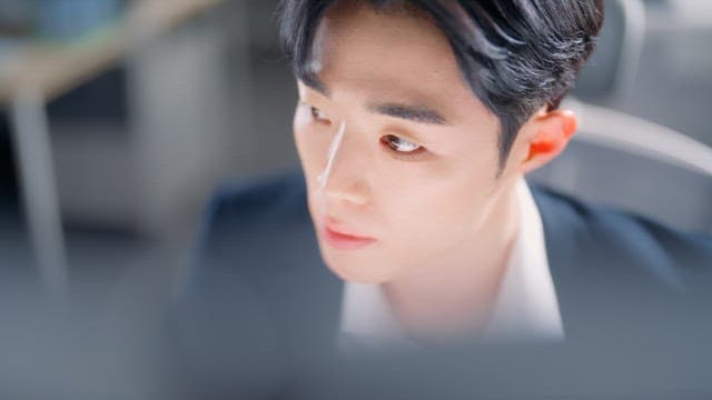 Focused man working at his desk