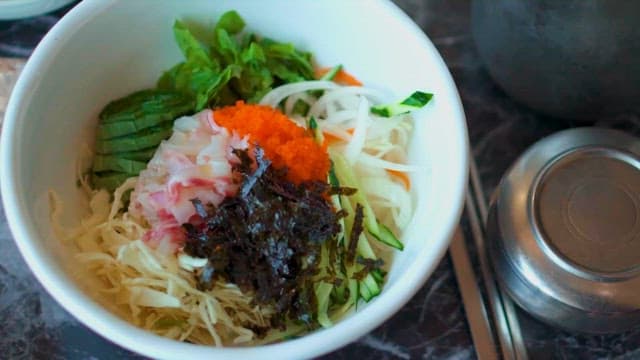 Assorted ingredients in a white bowl
