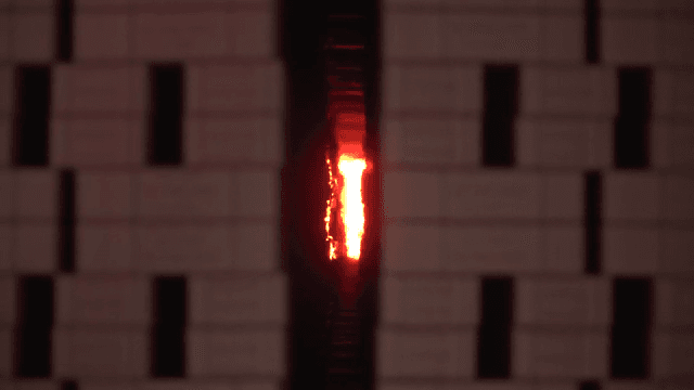 Bricks stacked in a kiln with glowing heat
