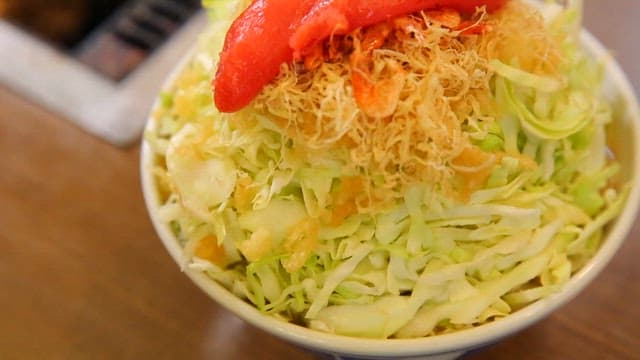 Bowl of Shredded Salad with Toppings