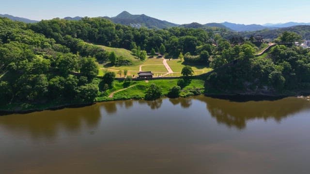 Lush green park with a traditional pavilion