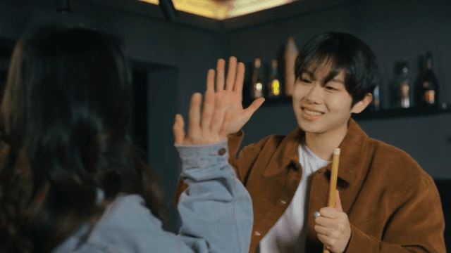 Friends Competing in a Game of Pool