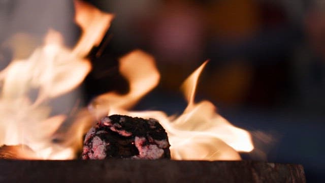 Burning charcoal with flames