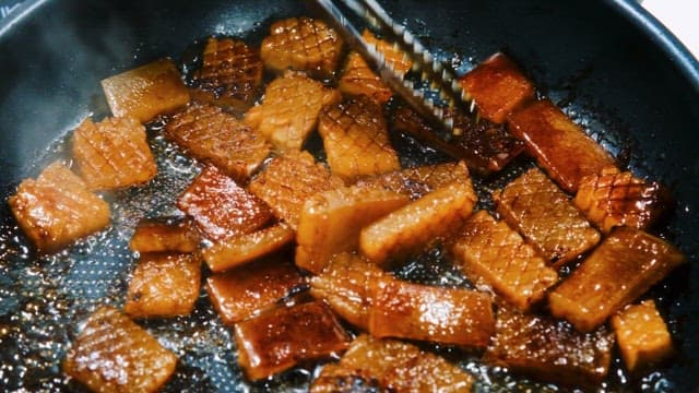 Pork Rind Sizzling in a Pan