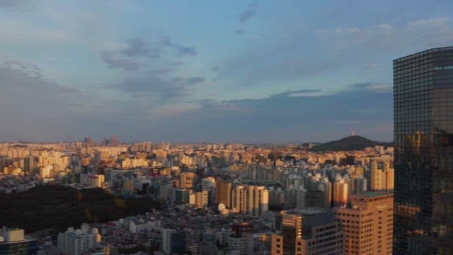 Cityscape with skyscrapers at sunset