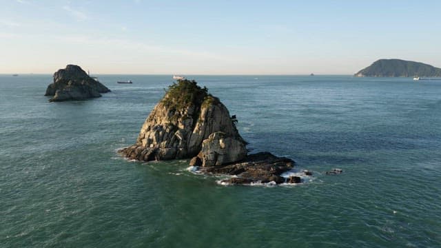 Rocky island surrounded by calm sea