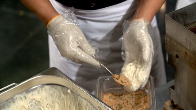 Chef preparing dough with sugar filling