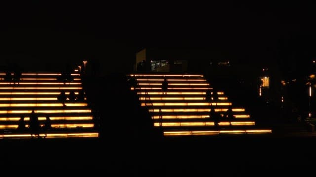 People enjoying the night sitting in the stair park on Nodeul Island