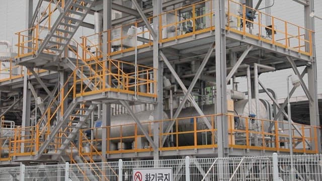 Industrial complex with metal structures and pipelines in a factory