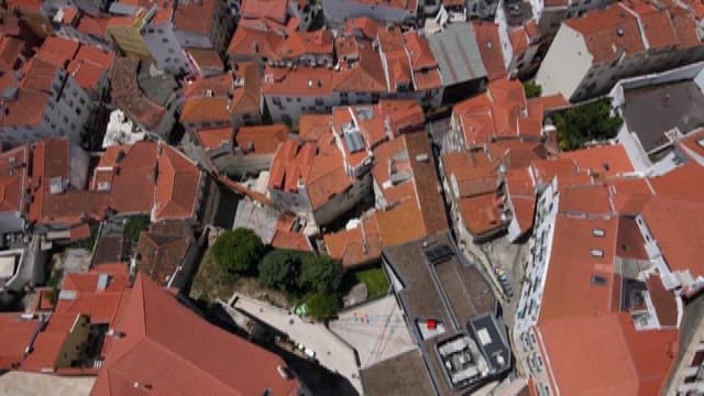 Densely Packed Urban Neighborhood with Red-roofed Buildings