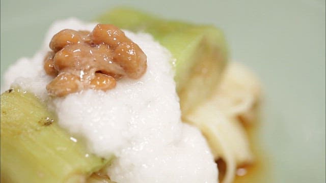 Close-up of a noodle dish with natto and grated yam