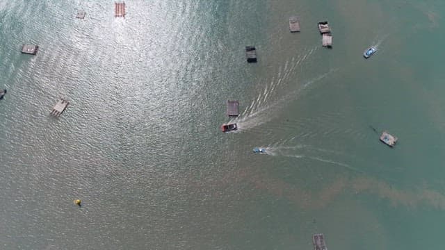 Boats navigating through calm waters