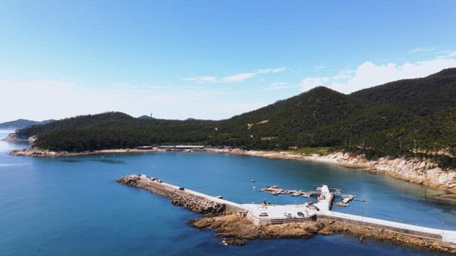 Peaceful coastal landscape with a pier