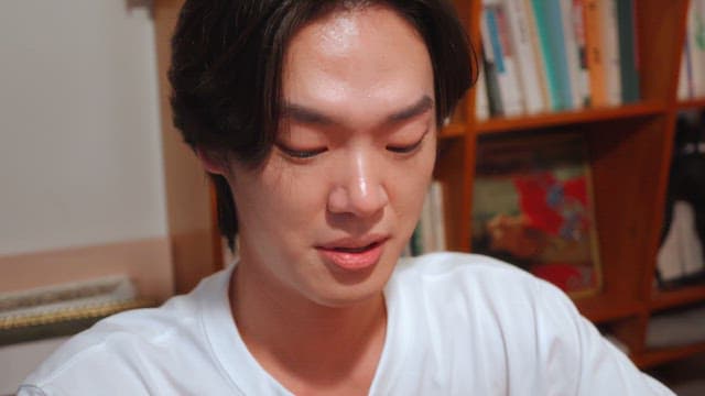 Man playing cards in a cozy room