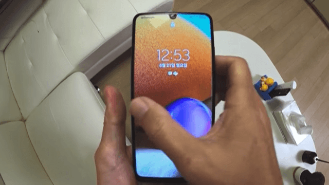 Person using a smartphone indoors