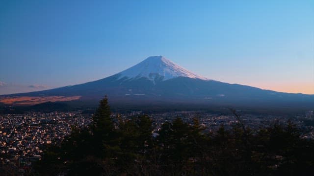 Magnificent Mountain Fuji and evening to night scenery of the city