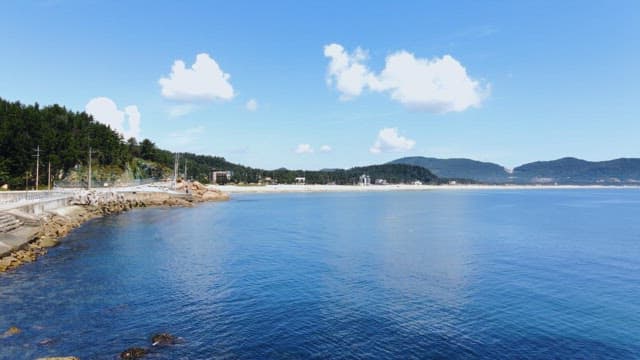 Serene beach with clear blue water