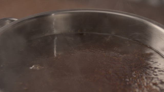 Scooping Red Bean Porridge with a Ladle