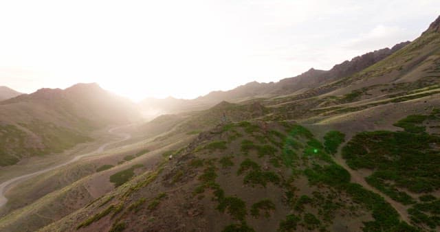 Person standing on a mountain ridge