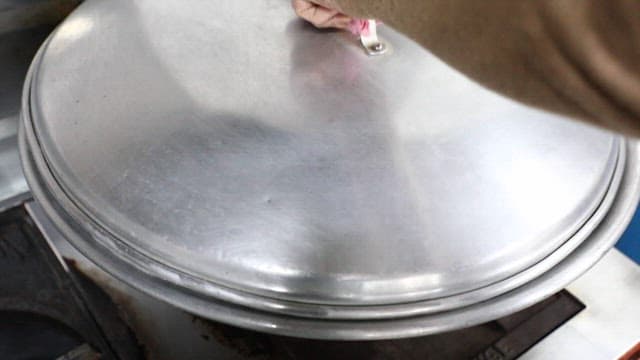 Delicious mussels cooking in a steamy pot