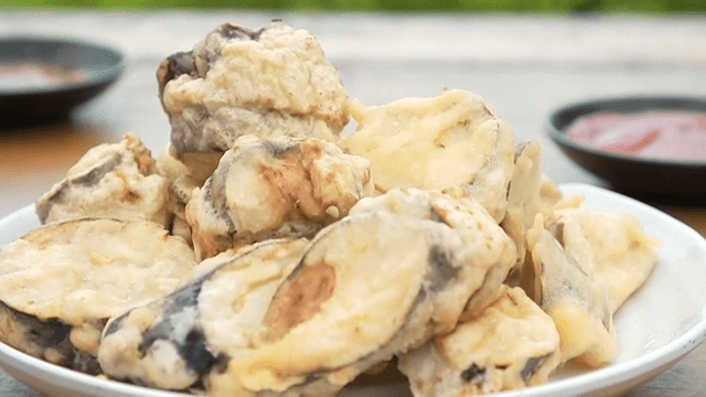 Crispy eggplant fritters plated on a plate