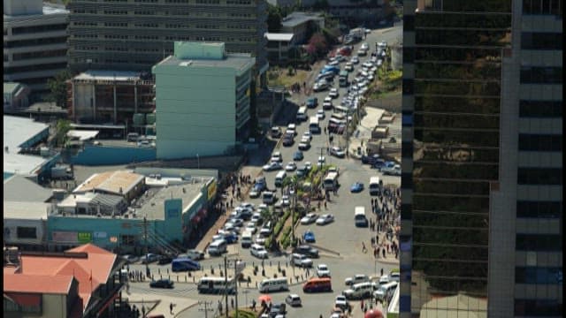 Bustling Cityscape with Traffic
