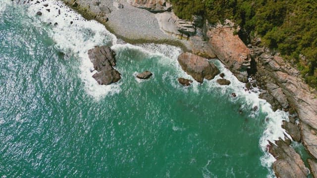 Rocky coastline with clear blue sea