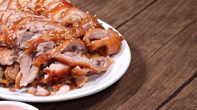 Pig's feet, sundae, and soft tofu stew served on a restaurant table