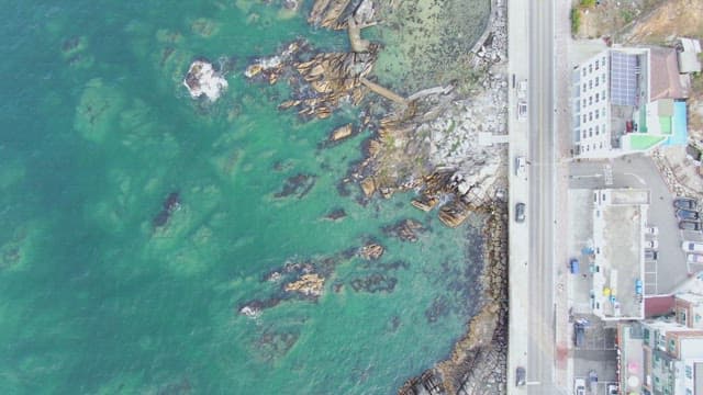 Coastal road and rocky shoreline