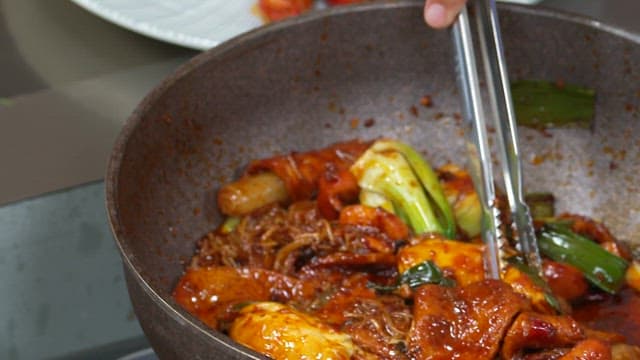 Hot and Spicy Stir-fried Vegetables Served on a White Plate