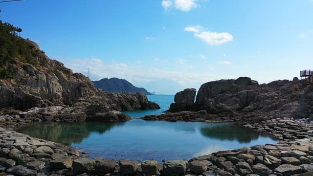 Tranquil Coastal Landscape with Rocky Cliffs