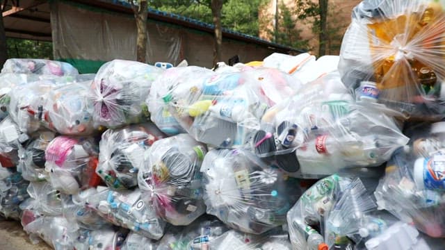 Vinyl containing plastic recycling waste