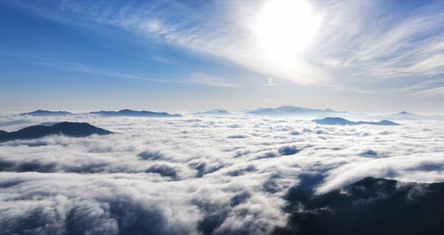 Clouds over mountain peaks