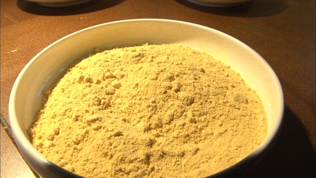 Finely ground yellow powder in a bowl
