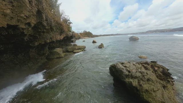 Waves crashing on a rocky shoreline