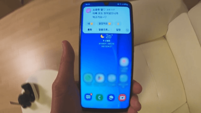 Person Using Smartphone Indoors